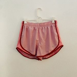 pink + red nike tempo shorts
